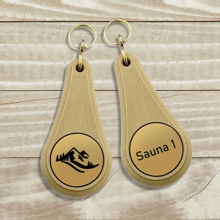 Wellness hotel keychain light brown – 1 pc